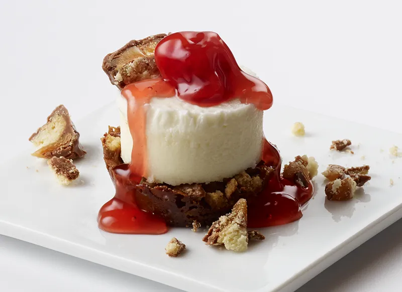 Sour Cherry Cheesecakes Made with Chopped TWIX®  Cookie Bars Crust marsfoodservices image