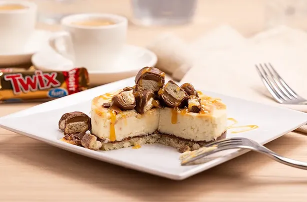 Snickerdoodle Crunch Cheesecake made with TWIX® Cookie Bars marsfoodservices image
